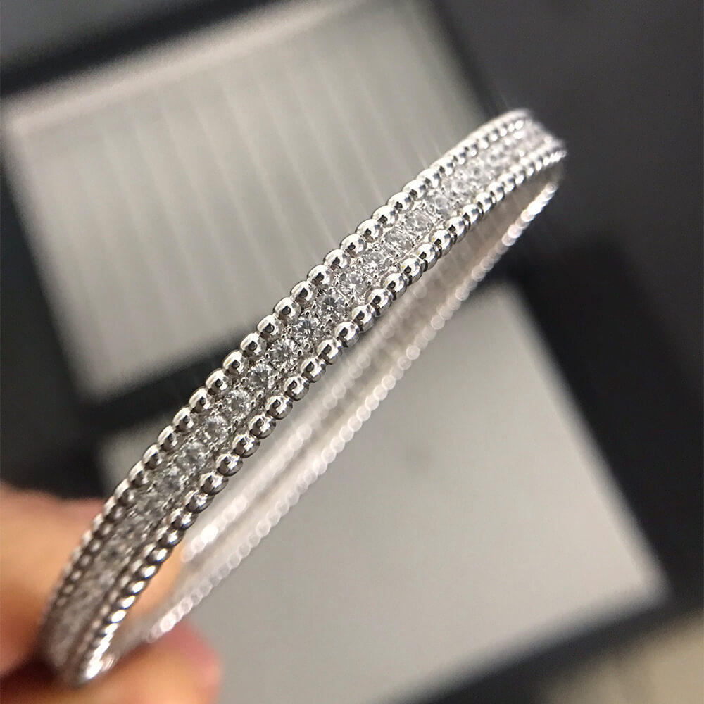 V*n Cl**f & Arpels Perlée D1am0nds bracelet, 1 row, medium model