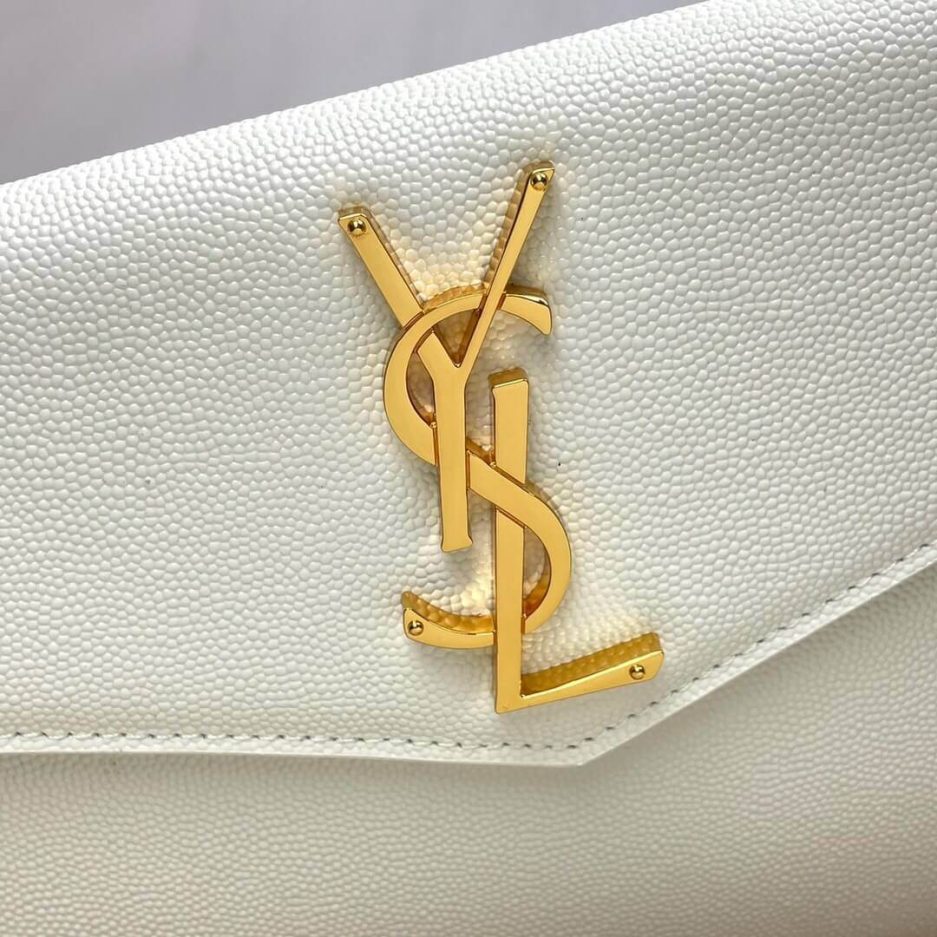 Y51 UPTOWN POUCH IN GRAIN DE POUDRE EMBOSSED LEATHER