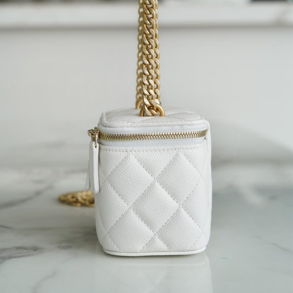 Ch**el small gold ball makeup bag