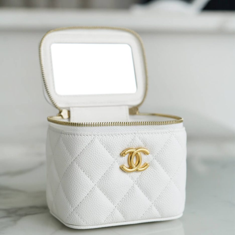 Ch**el small gold ball makeup bag