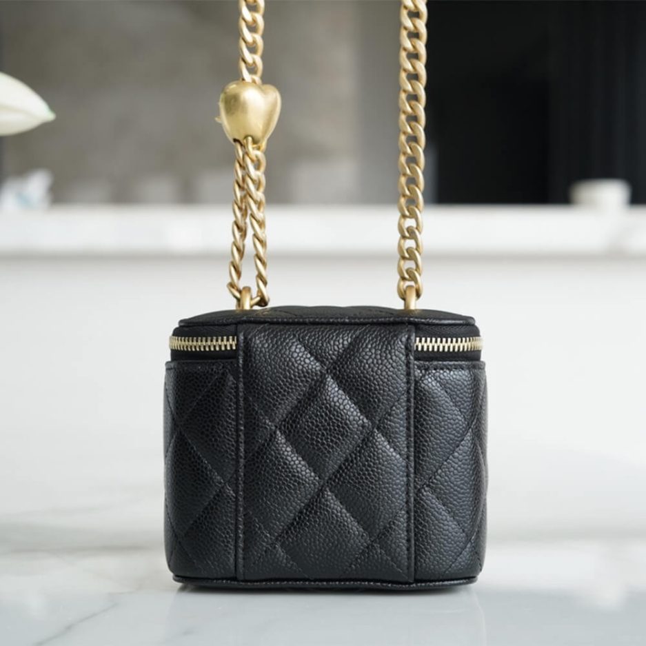 Ch**el small gold ball makeup bag