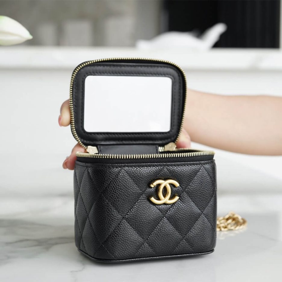 Ch**el small gold ball makeup bag
