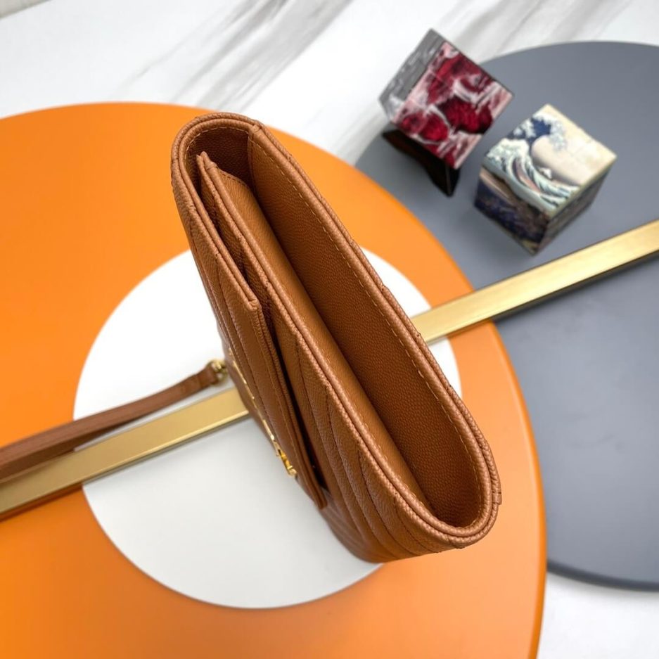 Y51 CASSANDRE matelassé leather flap clutch
