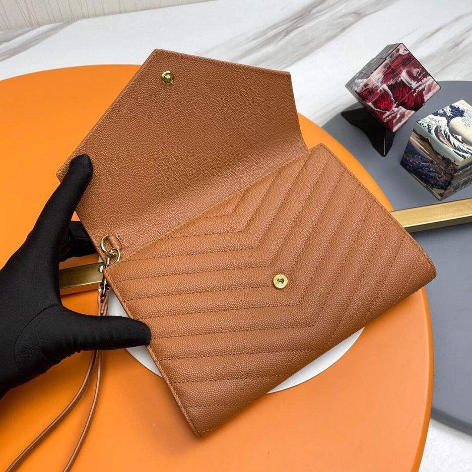 Y51 CASSANDRE matelassé leather flap clutch