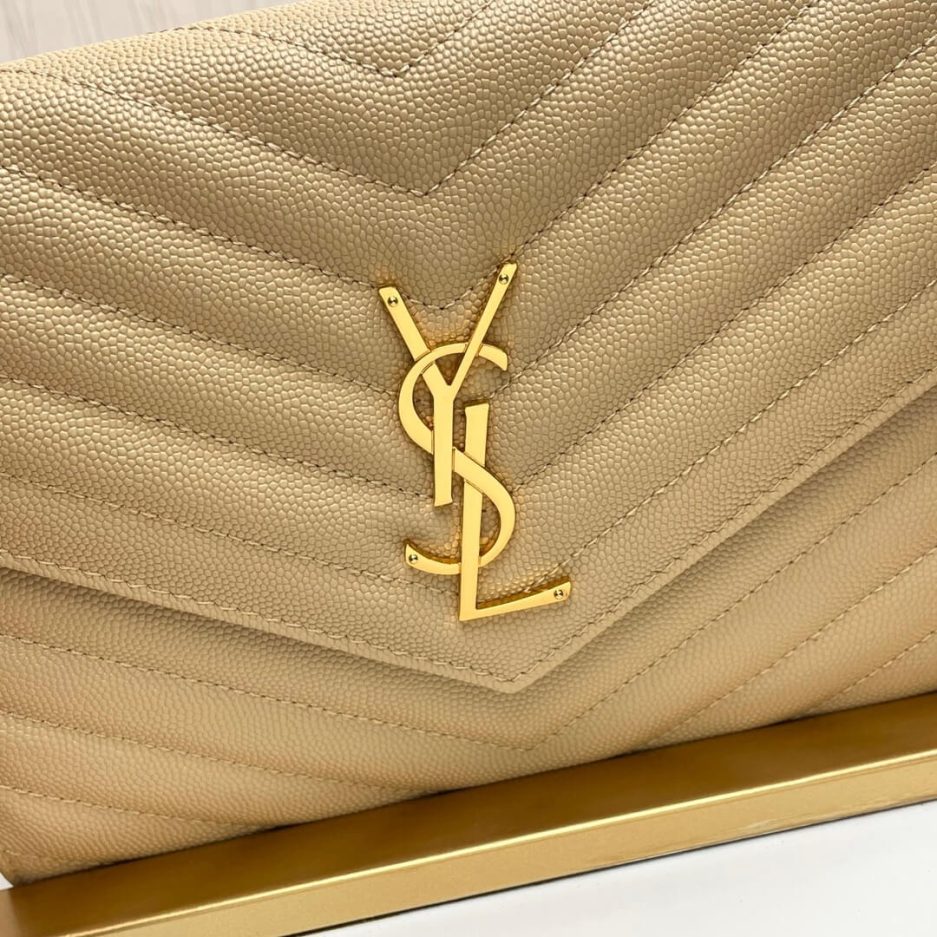 Y51 CASSANDRE matelassé leather flap clutch