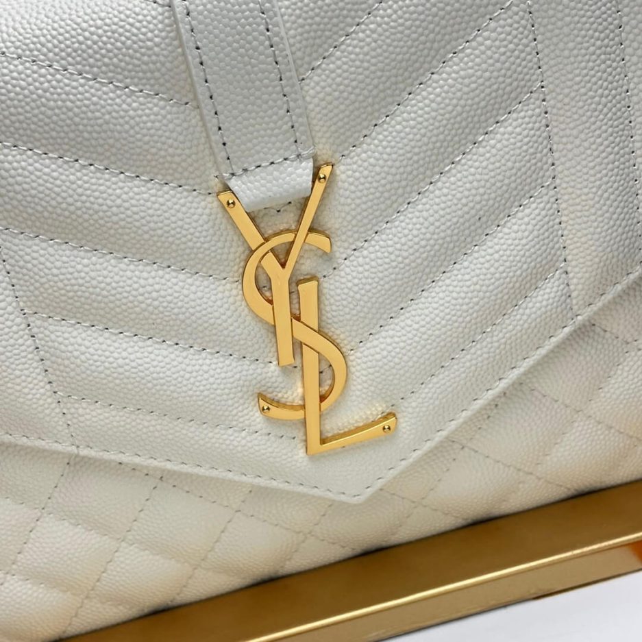 Y51 CASSANDRE matelassé leather flap clutch