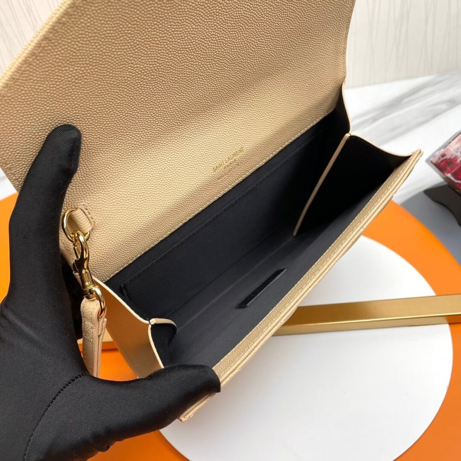 Y51 CASSANDRE matelassé leather flap clutch